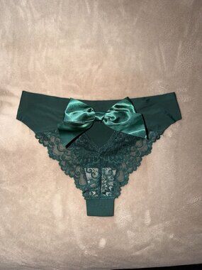Stylish brief panties with back bow and sheer lace back, size S/M